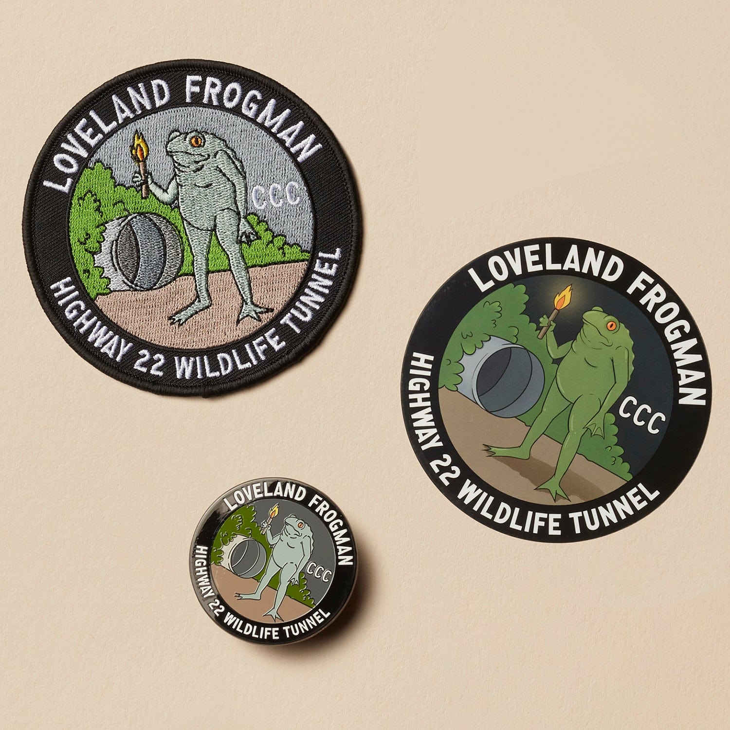 Loveland Frogman Wildlife Tunnel Set: Pin, Sticker, and Patch