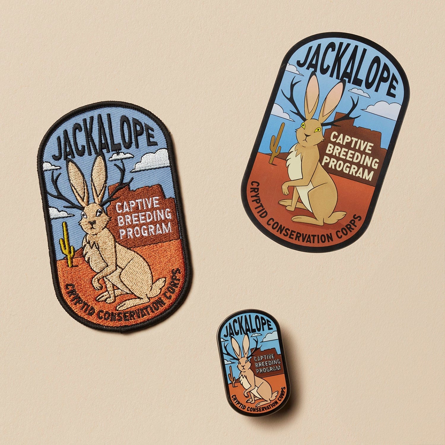 Jackalope Captive Breeding Program Set: Pin, Sticker, and Patch